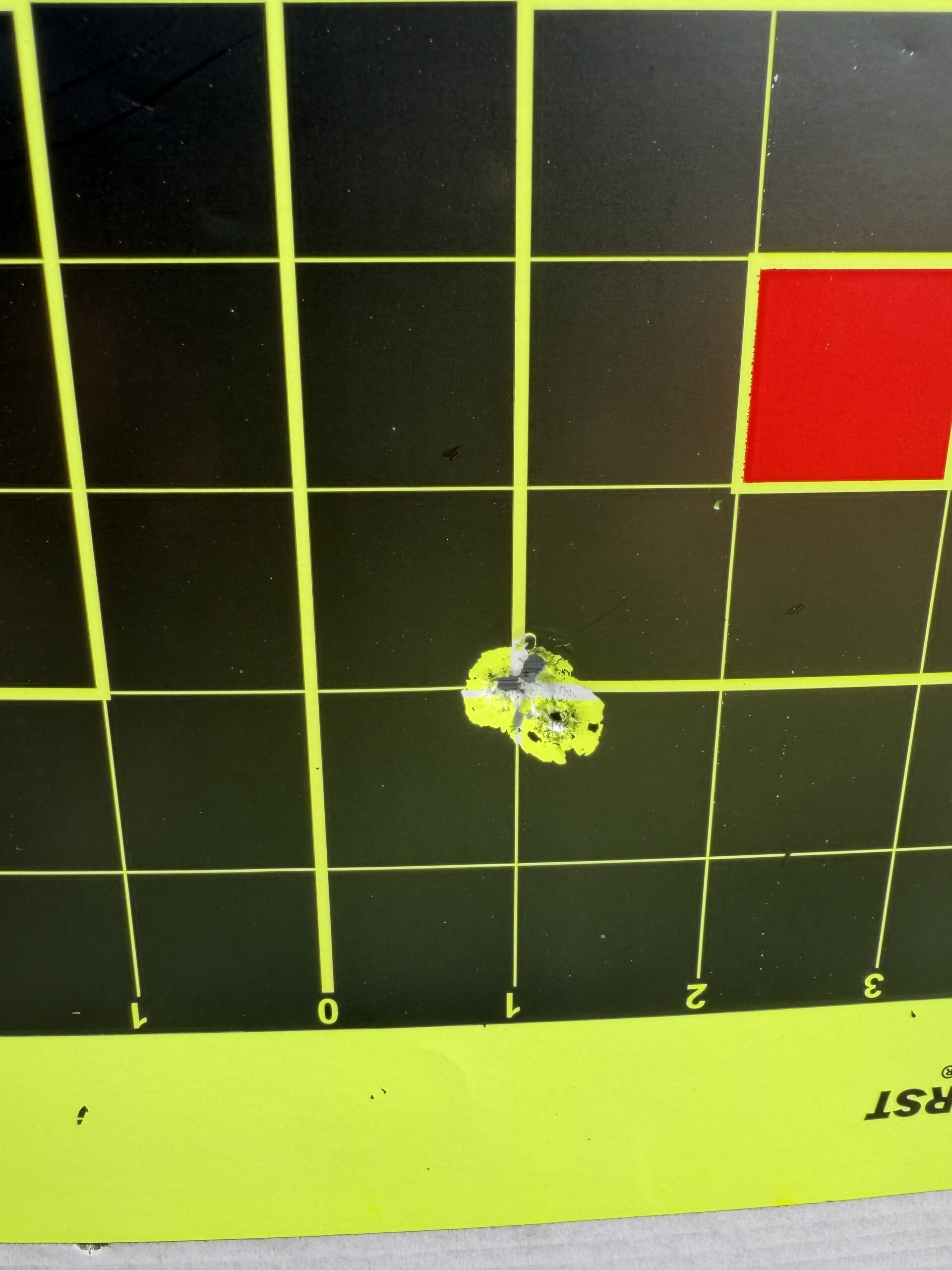 Precision rifle target showing a tight shot group